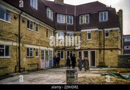 1978 archive image of Housing Association tenants on a visit to see newly refurbished and modernised properties at Anchor House, Newham, owned by Church Army Housing. Stock Photo