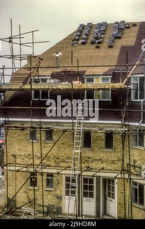 1978 archive image of re-roofing work as part of the modernisation & refurbishment of Anchor House, Newham, owned by Church Army Housing. Stock Photo