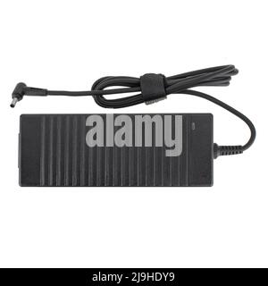 laptop power adapter, laptop spare part, white background Stock Photo