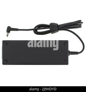 laptop power adapter, laptop spare part, white background Stock Photo