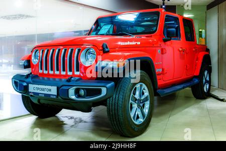 Minsk, Belarus - May 23, 2022: Jeep Wrangler Sahara. Red car Stock Photo