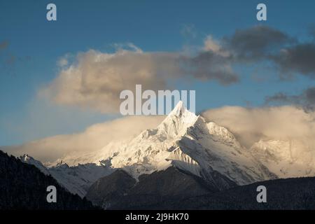 one of the peaks of meili snow mountain under the blue sky in yunnan province, china Stock Photo