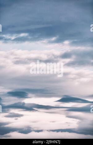 White and gray cloudscape at dusk Stock Photo