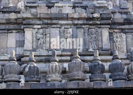 Reliefs that are still clearly visible on the walls of Prambanan temple that have been around for hundreds of years Stock Photo