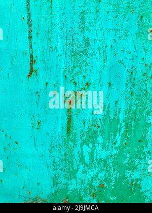 Turquoise painted metal wall with corrosion. Rusty spots. Old invoice. Backgrounds. Stock Photo