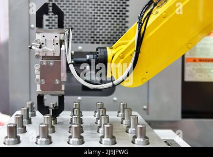 Automotive parts packing process for transfer on Automated conveyor systems industrial automation Stock Photo