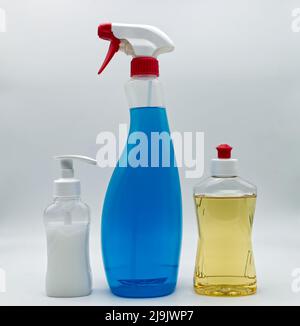 Transparent plastic bottles with dispenser. Full containers isolated on white background. Stock Photo
