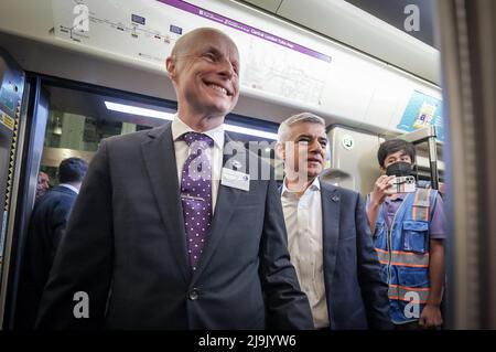 London, UK. 24th May 2022. London Mayor Sadiq Khan and TFL Commissioner Andy Byford board the first Elizabeth Line train at Paddington station 06.33 as it finally opens for public use on Tuesday morning. The massive Crossrail railway construction project finally begins to function after 13yrs with estimated costs nearly £19bn. Credit: Guy Corbishley/Alamy Live News Stock Photo