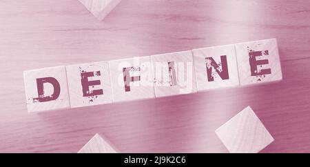 Define Word Written In Wooden Cube. Education concept. Stock Photo