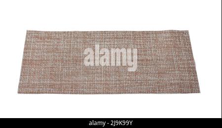Gray plastic wicker table placemat isolated on white Stock Photo