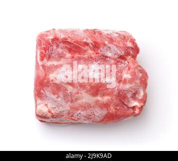 Top view of raw frozen boneless pork meat piece isolated on white Stock Photo