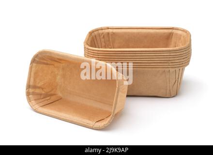 Empty disposable rectangular brown paper baking molds isolated on white Stock Photo