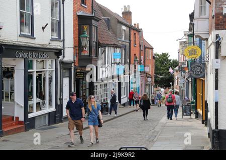 Steep Hill, a narrow cobbled street with its small restaurants and shops near Lincoln Cathedral, Lincoln, UK Stock Photo