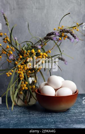 Simple composition still life with eggs. Easter card design. Stock Photo