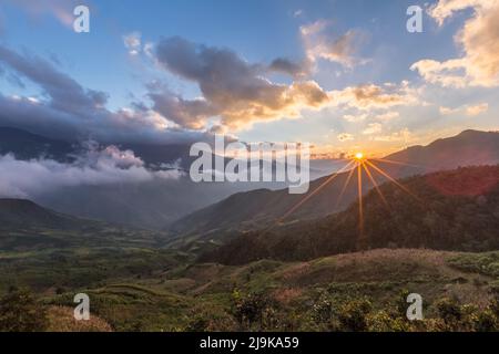 Cloudy sky with moutain view in sunrise. Ta Xua, Son La, Vietnam. Stock Photo