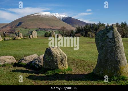 View looking from Castlerigg Stone Circle towards snow topped Blencathra in spring late winter Lake District National Park Cumbria England UK Britain Stock Photo