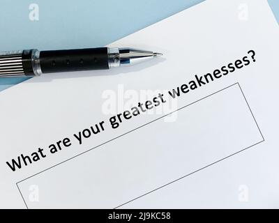 One person is answering question about profession. The person is thinking what is his greatest weakness. Stock Photo