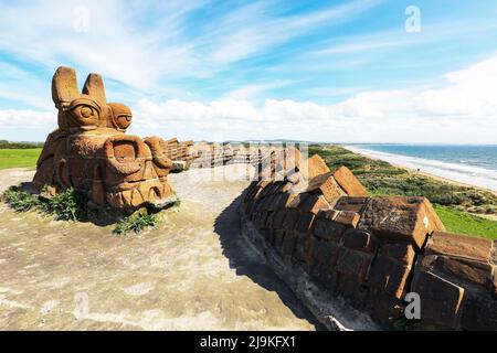 The Stone Dragon is known locally as the Great Protector of Irvine, Guardian of the Beach Park and Watcher on the Hill. Stock Photo