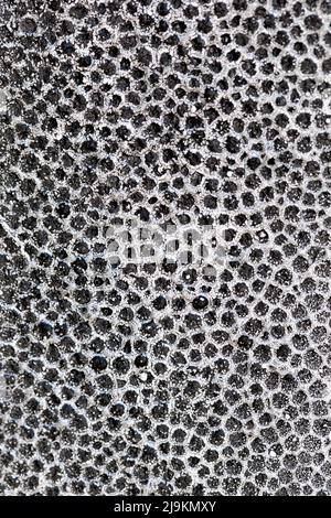Abstract background from black and white styrofoam ball texture. Polystyrene material packaging. Stock Photo