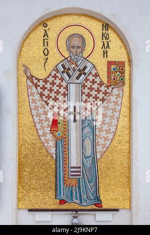Icon of St. Nicholas the Wonderworker from a multi-colored mosaic. Stock Photo