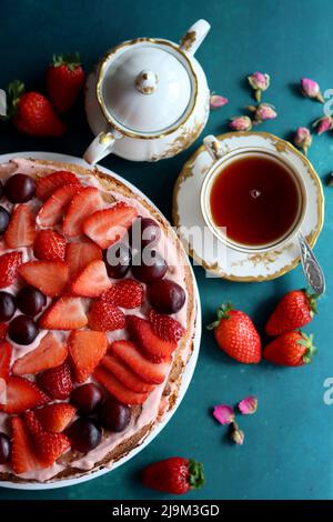 Close up photo of homemade strawberry layer cake.  Colorful still life with delicious tart. Stock Photo