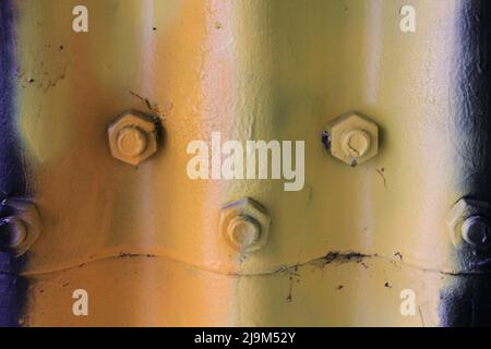 Painted corrugated steel tunnel in the big city of a smile made from bolts and a connection. Stock Photo
