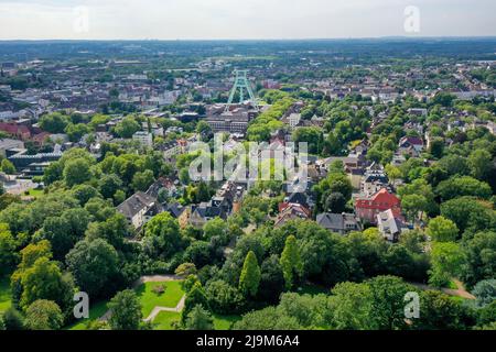 Bochum, North Rhine-Westphalia, Germany - city view Bochum with the colliery tower of the German Mining Museum in Bochum city center. In front residen Stock Photo