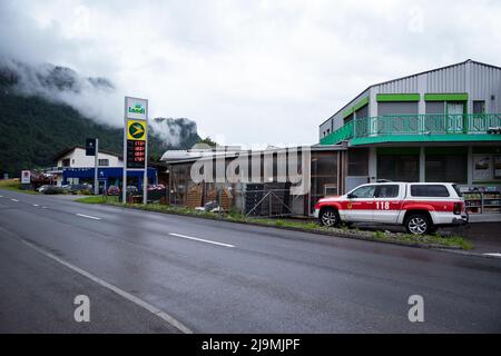 View of the petrol station with emergency vehicles parked in front of the Landi supermarket at Meiringen  village Switzerland Stock Photo