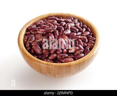 Red pinto beans in wooden bowl isolated on white background with clipping path Stock Photo