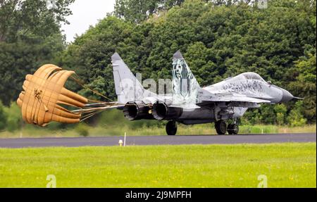 Slovak Air Force Mig-29 Fulcrum fighter jet landing with brake parachute on Leeuwarden Air Base. June 10, 2016 Stock Photo