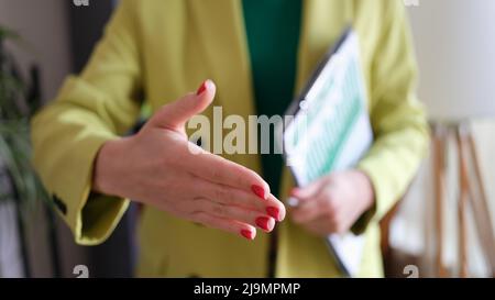 Business woman shaking hands and business arrangement Stock Photo
