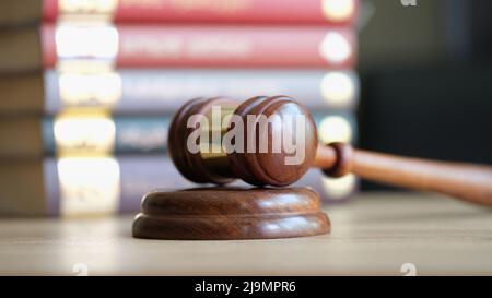 Judicial gavel and books in courtroom closeup Stock Photo