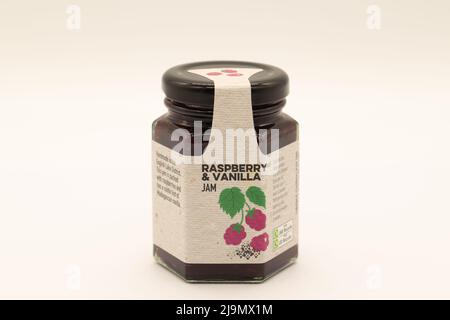 Irvine, Scotland, UK - May 18, 2022: Raspberry and vanilla jam by the Lakeland brand contained in a glass jar and metal lid that is recyclable along w Stock Photo