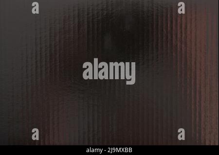 Black glossy paper sheet surface with lines macro close up view Stock Photo