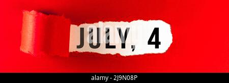 July 4 message on red paper torn ripped opening. Hollyday concept. Independence Day. Directly above shot. Banner design Stock Photo
