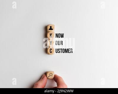 Concept know your customer or KYC. Text and icons on dice Stock Photo