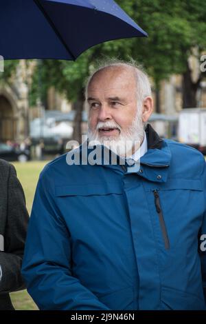 Francie Molloy attends, the British government plan to change the law in relation to the British agent and soldier who murder Irish Catholic and Irish Republic exempt from prosecution. The victims of the families here to seeking justice curry a coffin in front of Downing street, London, UK. - 24 May 2022. Stock Photo