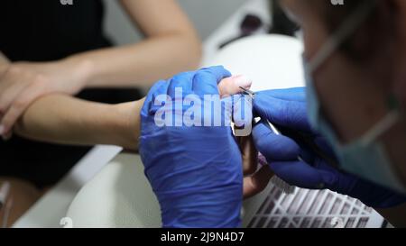 Tools for trimming nails and removing cuticles in spa for beauty treatments Stock Photo