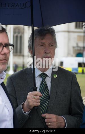 Mickey Brady attends, the British government plan to change the law in relation to the British agent and soldier who murder Irish Catholic and Irish Republic exempt from prosecution. The victims of the families here to seeking justice curry a coffin in front of Downing street, London, UK. - 24 May 2022. Stock Photo