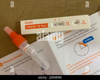Positive results of a home COVID-19 testing kit, received from the government, in New York on Wednesday, May 18, 2022.  (© Frances M. Roberts) Stock Photo