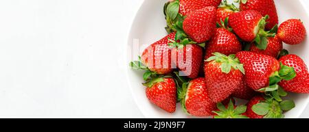 Strawberry on white background. Top view. Banner. Stock Photo