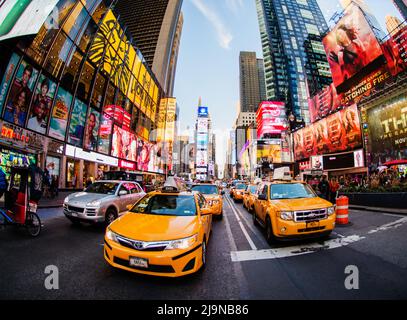 Taxi cabs in Times Square, Manhattan, New York City Stock Photo