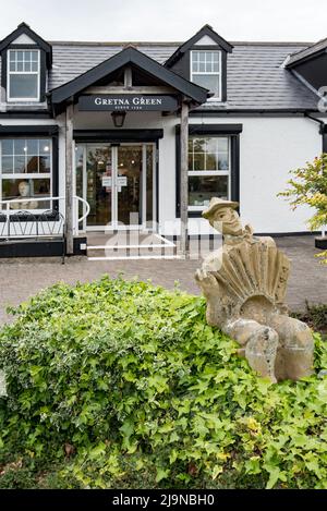 Gretna Green Scottish wedding venue at the Blacksmiths shop.Various sculptures are on display plus the Wall of Love, lovelocks & sculpture courtyard. Stock Photo