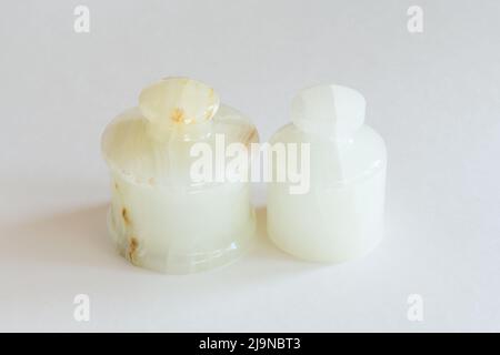Two round onyx boxes mock up on white background. Stock Photo
