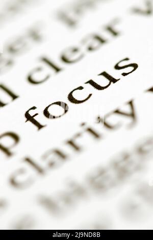 Close up of the typed word focus printed in black ink on white ink jet paper Stock Photo