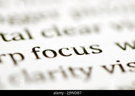 Close up of the typed word focus printed in black ink on white ink jet paper Stock Photo