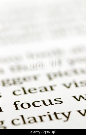 Close up of the typed word focus printed in black ink on white ink jet paper Stock Photo