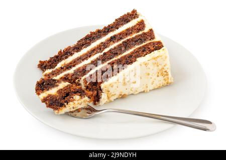 Slice of carrot cake with cream cheese filling and frosting on white plate with mouthful of cake on fork isolated on white. Stock Photo