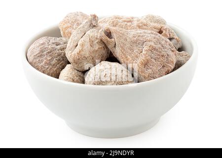 Dusted dried baby figs in a white ceramic bowl isolated on white. Stock Photo