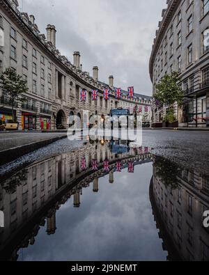 Reflections on Regents Street during Her Majesty The Queen’s Platinum Jubilee in 2022 Stock Photo